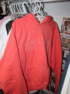 Essentials Coral-Red Pullover Hoodie with Subtle Logo